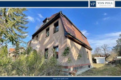 Zweifamilienhaus mit weitläufigem Garten in idyllischer, grüner Lage von Schöneiche