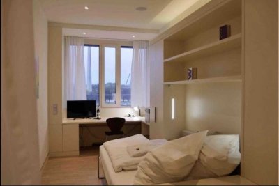 Stilvolles Miniapartment mit Concierge-Service und Fitnessbereich im Herzen der Stadt