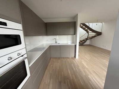 Seltene Maisonette im Erstbezug mit Dachterrasse & 2 Balkonen – Alexisquartier