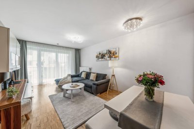 NEUWERTIGE 2-ZIMMER-WOHNUNG MIT GROßZÜGIGEM BALKON UND TIEFGARAGENSTELLPLATZ IN LIEFERING