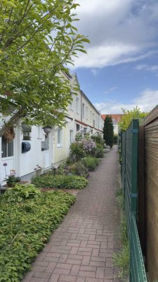 Familienfreundliches Raumwunder in ruhiger Spielstraße – gepflegtes 4 Zimmer Reihenhaus mit Garten