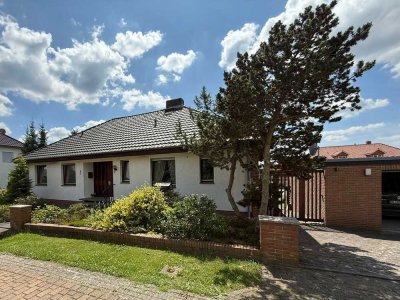 Winkelbungalow mit möglicher Einliegerwohnung in beliebter Wohnlage