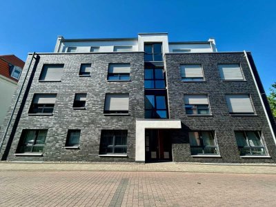 Zentrale Erdgeschosswohnung mit Terrasse, Garten und Einbauküche!