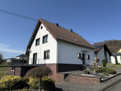 Familienfreundliches Einfamilienhaus mit schönem Grundstück