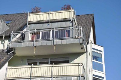 Burscheid-Stadt, offene Architektur, hell&sonnig, 3 Zimmer, Küche, Balkon, Gäste-WC, Garage im Haus