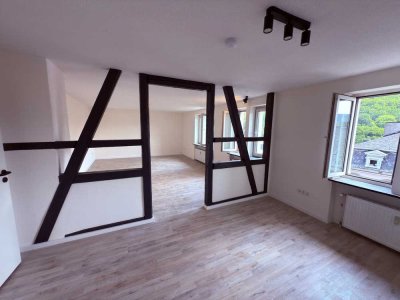 Sanierte 3,5 Zimmer Wohnung mit eigenem Gartenabteil und EBK