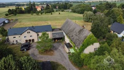 Mehrfamilienhaus im Dornröschenschlaf & ca. 1600m² erschlossenes Bauland