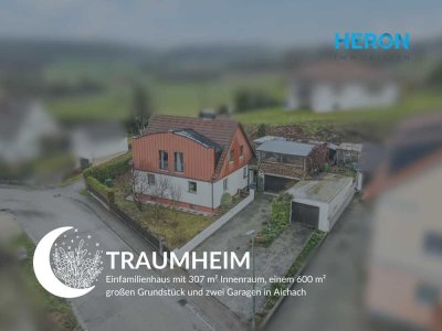 TRAUMHEIM - Einfamilienhaus mit 307 m² Innenraum, einem 600 m² großen Grundstück und zwei Garagen