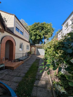 Solide DHH mit Anbau, lfd. modernisiert, mit Garten, Garage, Terrasse u. neuer Heiztechnik prov.frei