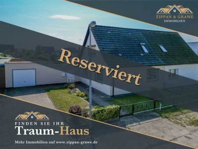 Reserviert – gemütliche Doppelhaushälfte mit Wintergarten und separatem Gäste-Bungalow