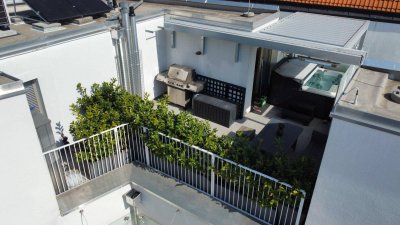 Top ausgestattete Traumwohnung mit 40 m² Dachterrassen, optional 2 Garagenplätzen mit E-Ladestation