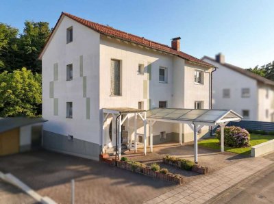 Erdgeschosswohnung mit Hauscharakter, Garten und Garage