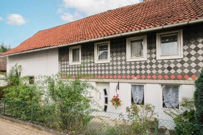 Charmantes Einfamilienhaus mit Sanierungsbedarf – inklusive Garten & Garage