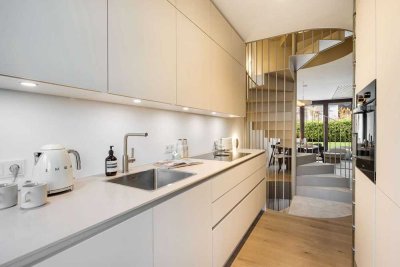 Neubau: Mittelhaus mit Garten in traumhafter Lage