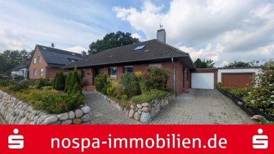 Mit Ausbaupotenzial! Winkelbungalow mit Garage in ruhiger Lage von Schleswig-Nord!