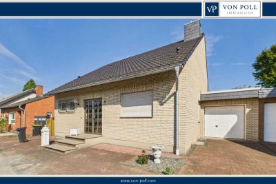 Zeitlose Eleganz in Split-Level-Bauweise – mit Kamin, Garage und Dachausbauoption