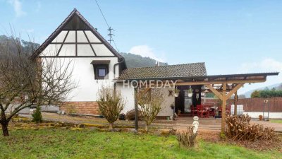 Idyllisches Einfamilienhaus mit großem Garten und zusätzlichem Baugrundstück in ruhiger Lage