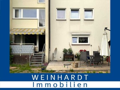 Wohnen auf zwei Ebenen mit eigenem Garten und sonniger Terrasse