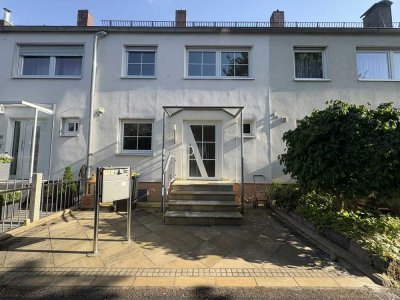 Ihr neues Zuhause: Gepflegtes RMH mit Gartenidylle und Ausbaupotenzial in Nürnberg-Weiherhaus