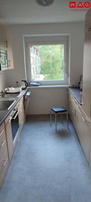 Freundliche 2-Zimmerwhg. in herrlicher Sonnenlage im Grünen – mit Balkon &amp; Garage!