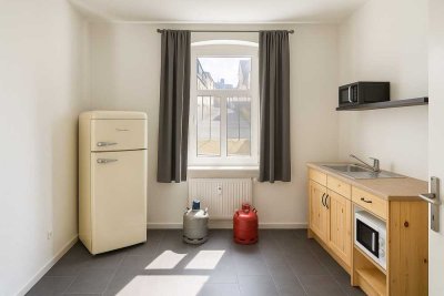 1 Raum Wohnung, auf Wunsch mit EBK im Herzen von Meerane