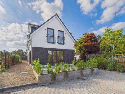 Neubau-Doppelhaushälfte mit exzellentem Energiestandard und sonniger Terrasse