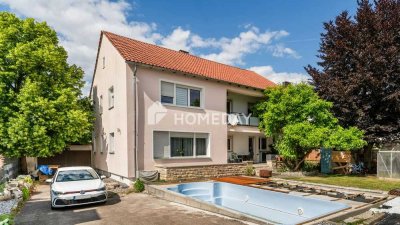 Familienidyll mit Potenzial: stilvolles Zweifamilienhaus mit Pool und Garten in Ingolstadt