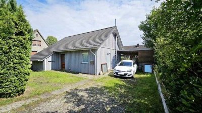 immo-schramm.de: Holzwohnhaus in skandinavischer Bauweise mit Carport