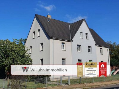Mehrfamilienhaus in zentraler Lage mit viel Grün