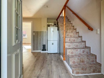 Ihr neues Zuhause im Norden: Doppelhaushälfte in dörflicher Lage.