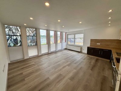Moderne lichtdurchflutete Wohnung mit eigener Terasse und Stellplätzen