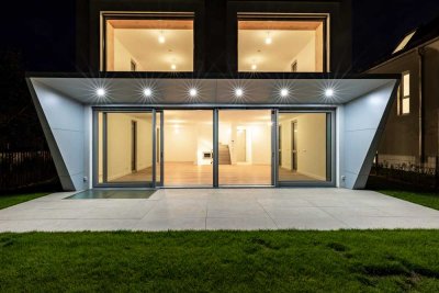 Einfamilienhaus mit 6-7 Zimmern - Tiefgarage - Erstbezug mit unverbautem Blick Richtung Süden