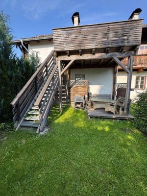 Eigentumswohnung mit großer westseitiger Terrasse und ostseitigem Balkon, Garten, Garage u. Parkplätze