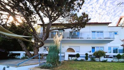 Dreifamilienhaus mit eigenem Seezugang in Leopoldsdorf bei Wien.