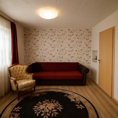 Einladendes Einfamilienhaus mit großzügiger Terrasse für unvergessliche Momente.