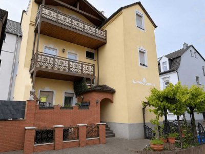 Attraktives Mehrfamilienhaus mit 4 Garagen: Leerstand nutzen und über 7 % Rendite erzielen