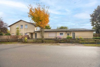 Mehrfamilienhaus mit vier Wohneinheiten, Garten und Entwicklungspotenzial