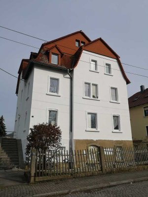 Attraktives Mehrfamilienhaus Vermietet in zentraler Lage von Arnsdorf – Investieren Sie in eine soli