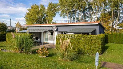 Ihr Ferien-Bungalow in erster Reihe zum Wasser – gepflegt, modernisiert und auf Erbpachtgrundstück