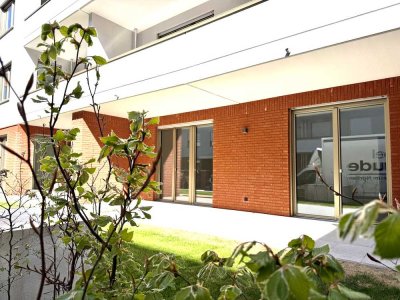 KFW55, exklusive  Wohnung mit Garten, zwei großen Terrassen, Fernwärme und Tiefgarage