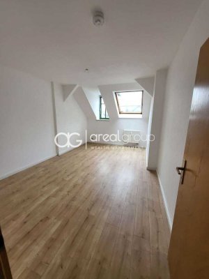 Charmante Maisonettewohnung mit EBK im DG