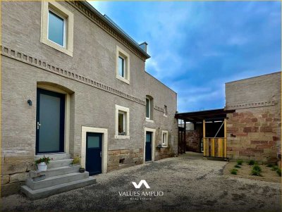 Ein Zuhause zum Verlieben – Modernes Wohnen mit direktem Wasserzugang