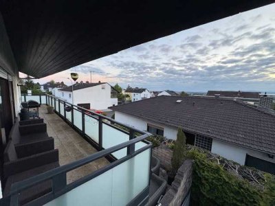 2 ZW mit EBK, Tgl. Bad, großer Balkon und Taunusblick in ruhiger Ortsrandlage