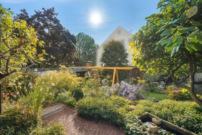 Großzügiges Wohnhaus mit Garten und drei Garagen direkt am Mittellandkanal