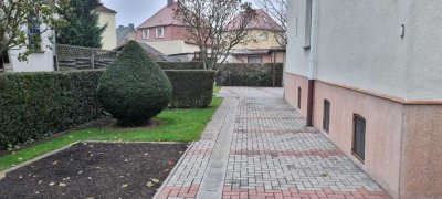 Großes Glück in kleinen Höhen! Ihre gemütliche Dachwohnung mit kleinem Gartenbereich wartet auf SIE!