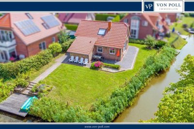 Greetsieler Rarität! Von Wasser umgebenes Ferienhaus in gefragter Lage