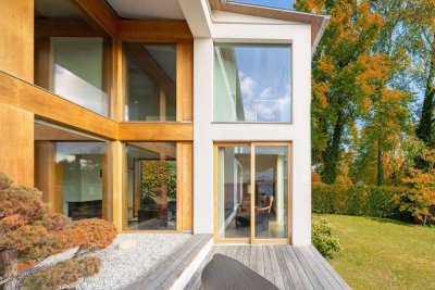 Lichtfülle und Transparenz: Familienoase mit traumhaftem Garten in Laufnähe zum See