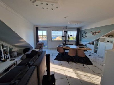 Helle Dachgeschosswohnung mit Fernblick!