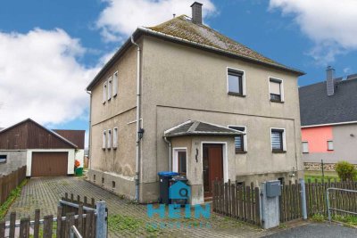 Ruhepol mit Zukunft: Ausbaufähiges Familienhaus in Reitzenhain