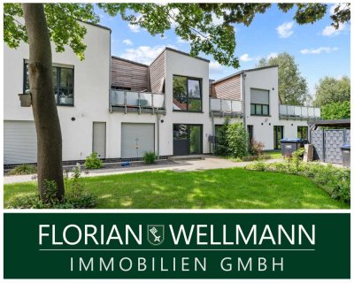 Traumhafte Erdgeschosswohnung mit hochwertiger Ausstattung und idyllischem Garten in bester Lage